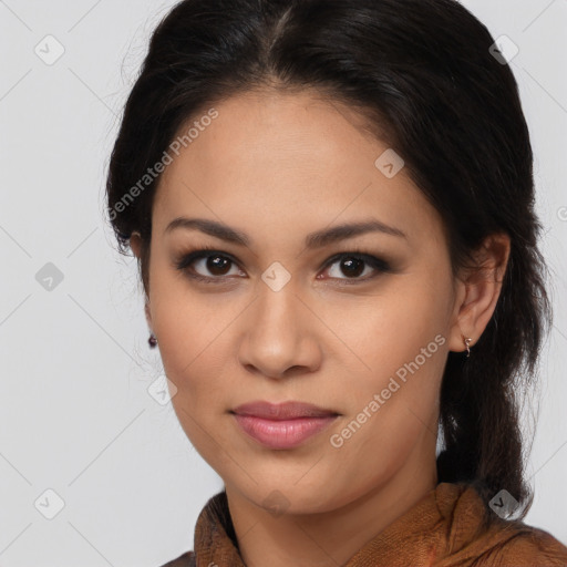 Joyful latino young-adult female with medium  brown hair and brown eyes