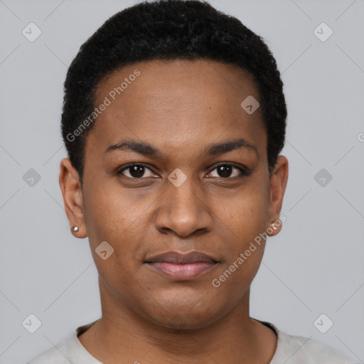 Joyful black young-adult female with short  black hair and brown eyes