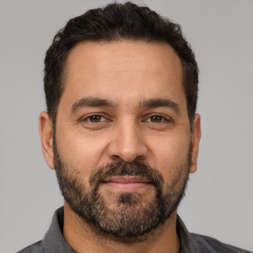 Neutral white adult male with short  black hair and brown eyes