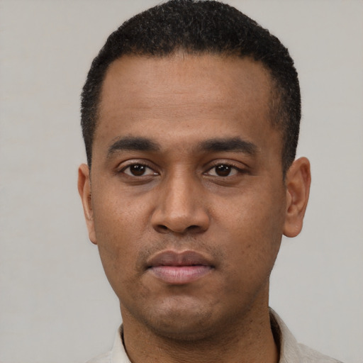 Neutral latino young-adult male with short  black hair and brown eyes