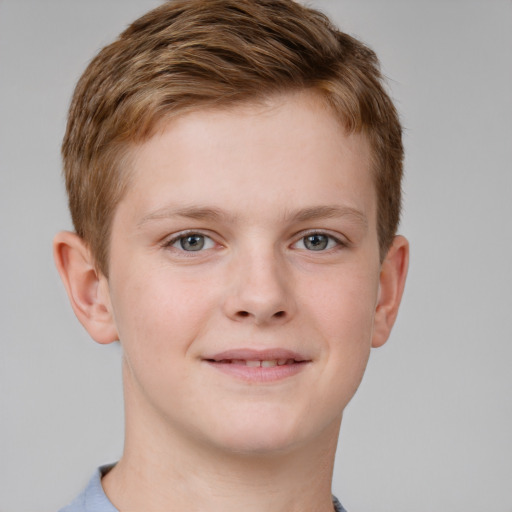 Joyful white child male with short  brown hair and grey eyes