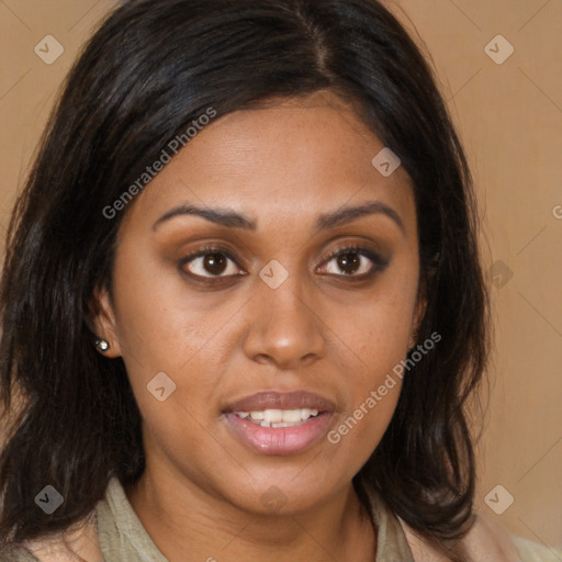 Joyful latino young-adult female with medium  brown hair and brown eyes