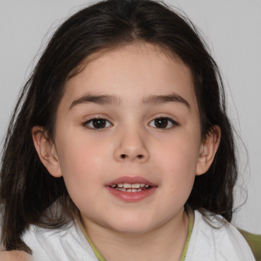 Joyful white child female with medium  brown hair and brown eyes