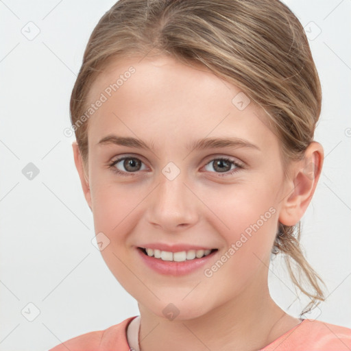 Joyful white child female with medium  brown hair and brown eyes