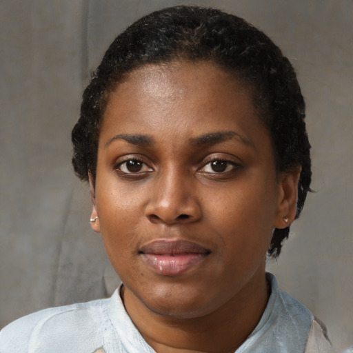 Neutral black young-adult female with short  brown hair and brown eyes