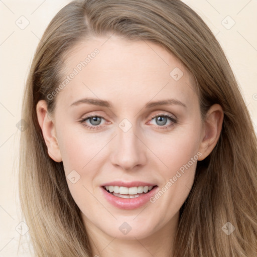 Joyful white young-adult female with long  brown hair and blue eyes