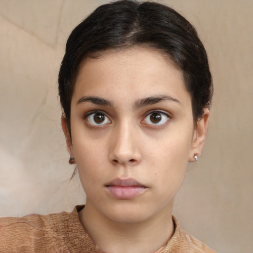 Neutral white young-adult female with short  brown hair and brown eyes