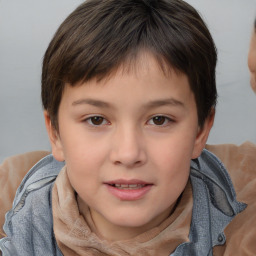 Joyful white child female with short  brown hair and brown eyes