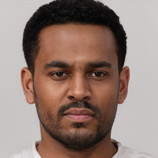 Neutral black young-adult male with short  black hair and brown eyes