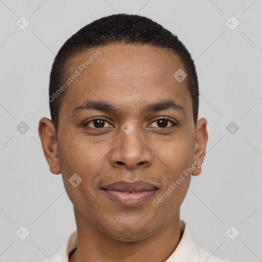 Joyful black young-adult male with short  black hair and brown eyes