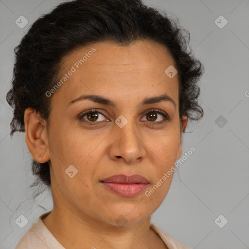 Joyful latino adult female with medium  brown hair and brown eyes