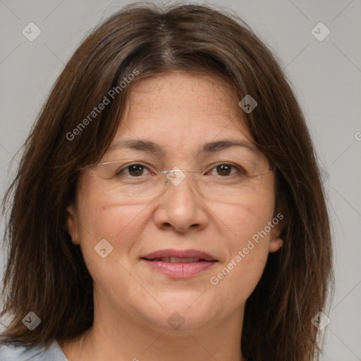 Joyful white adult female with medium  brown hair and brown eyes