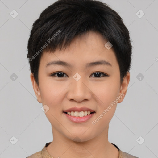 Joyful asian young-adult female with short  black hair and brown eyes