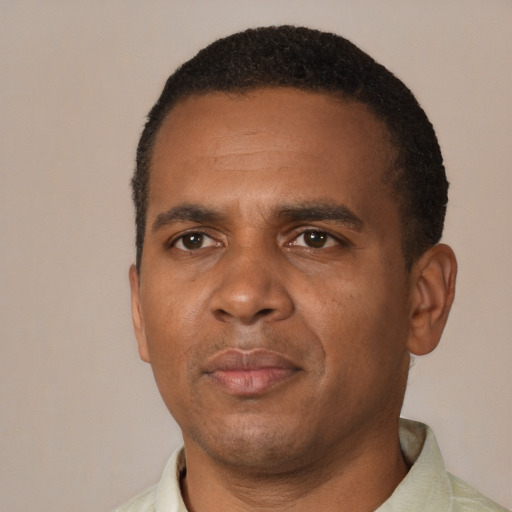 Neutral black adult male with short  black hair and brown eyes