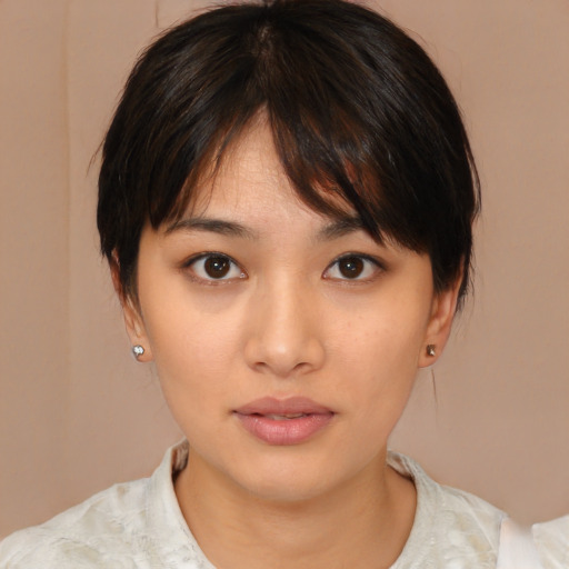 Neutral white young-adult female with medium  brown hair and brown eyes