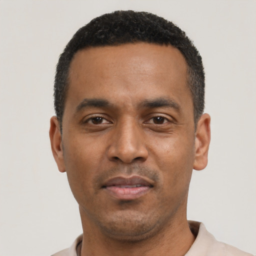 Neutral black young-adult male with short  black hair and brown eyes