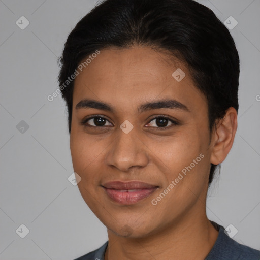 Joyful latino young-adult female with medium  brown hair and brown eyes