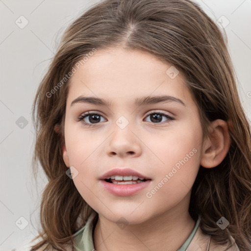 Joyful white child female with medium  brown hair and brown eyes