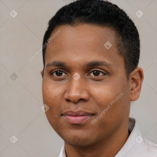 Joyful black young-adult male with short  black hair and brown eyes