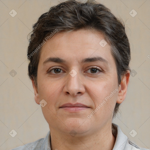 Joyful white adult female with short  brown hair and brown eyes