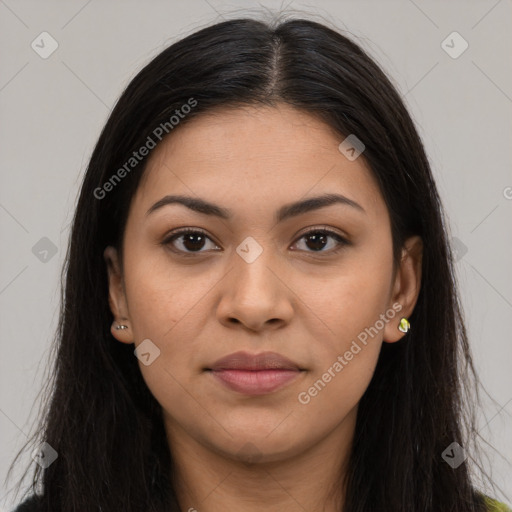 Joyful latino young-adult female with long  brown hair and brown eyes