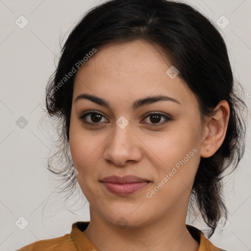 Joyful latino young-adult female with medium  brown hair and brown eyes