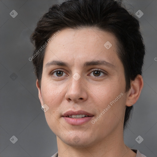 Joyful white adult female with short  brown hair and brown eyes