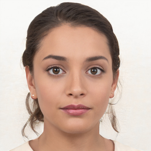 Neutral white young-adult female with medium  brown hair and brown eyes