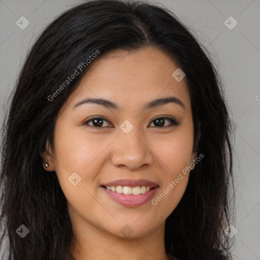 Joyful asian young-adult female with long  brown hair and brown eyes