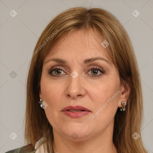 Joyful white adult female with medium  brown hair and brown eyes