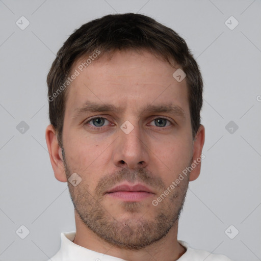 Neutral white young-adult male with short  brown hair and brown eyes