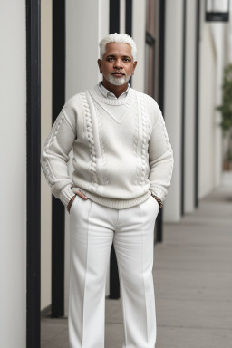 Dominican middle-aged male with  white hair