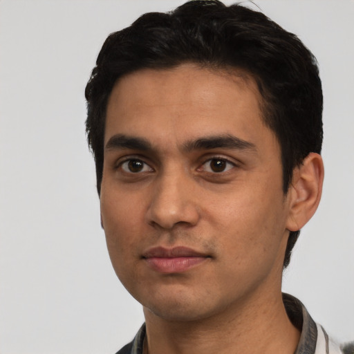 Neutral latino young-adult male with short  black hair and brown eyes