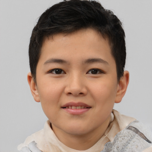 Joyful asian child female with short  brown hair and brown eyes