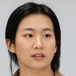 Neutral asian young-adult female with medium  black hair and brown eyes