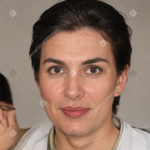 Joyful white adult female with medium  brown hair and brown eyes