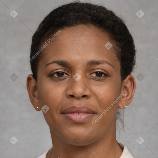 Joyful black young-adult female with short  brown hair and brown eyes