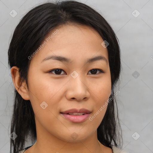 Joyful asian young-adult female with medium  brown hair and brown eyes