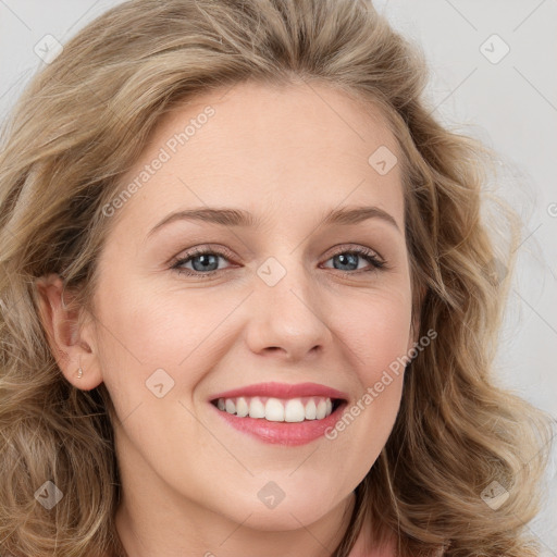 Joyful white young-adult female with long  brown hair and blue eyes