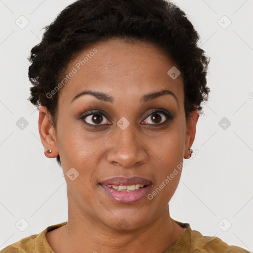 Joyful black young-adult female with short  brown hair and brown eyes