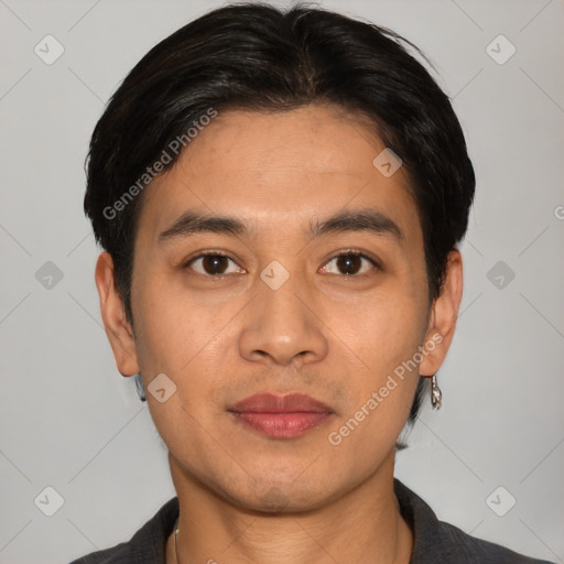 Joyful white young-adult male with short  black hair and brown eyes