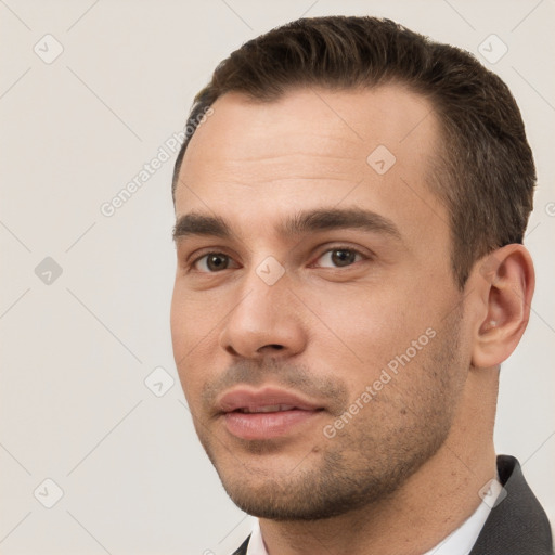 Neutral white young-adult male with short  brown hair and brown eyes