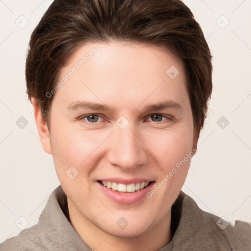 Joyful white young-adult female with short  brown hair and grey eyes