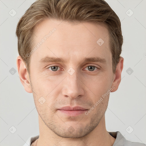 Neutral white young-adult male with short  brown hair and grey eyes