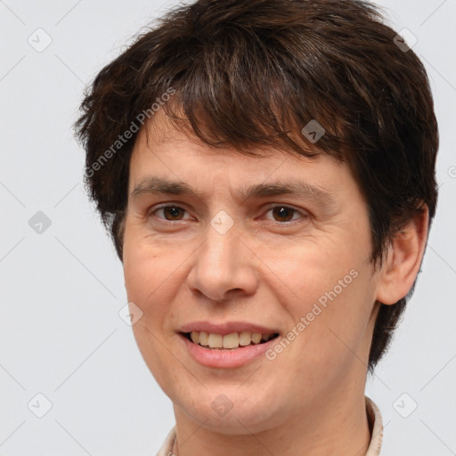 Joyful white adult female with short  brown hair and brown eyes