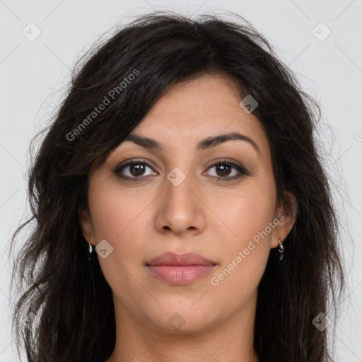 Joyful latino young-adult female with long  brown hair and brown eyes