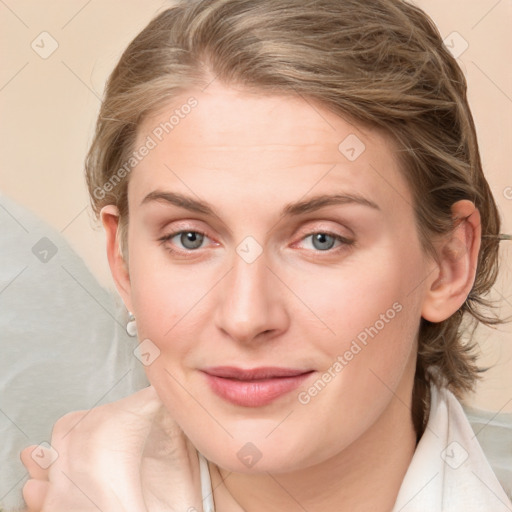 Joyful white young-adult female with medium  brown hair and blue eyes