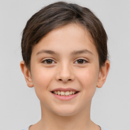 Joyful white child female with short  brown hair and brown eyes