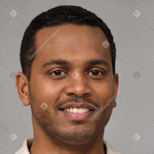 Joyful latino young-adult male with short  brown hair and brown eyes