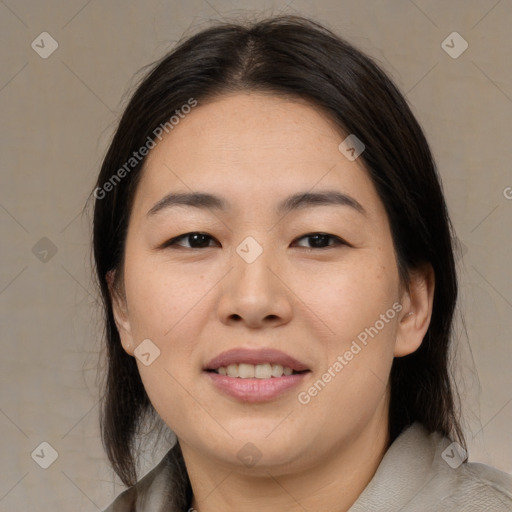 Joyful asian young-adult female with medium  brown hair and brown eyes